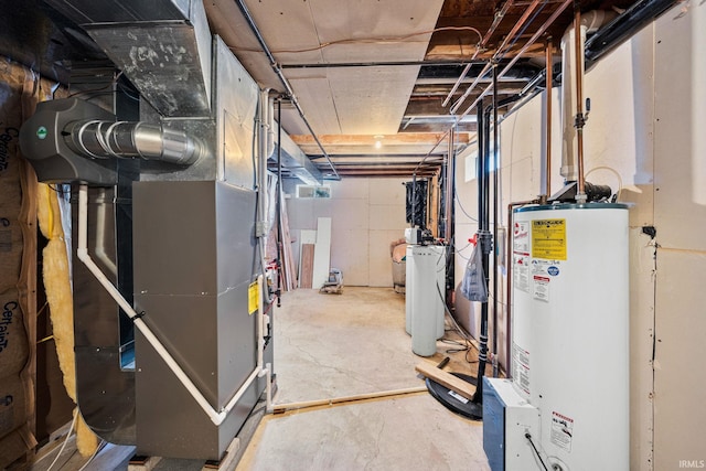unfinished basement with heating unit and gas water heater