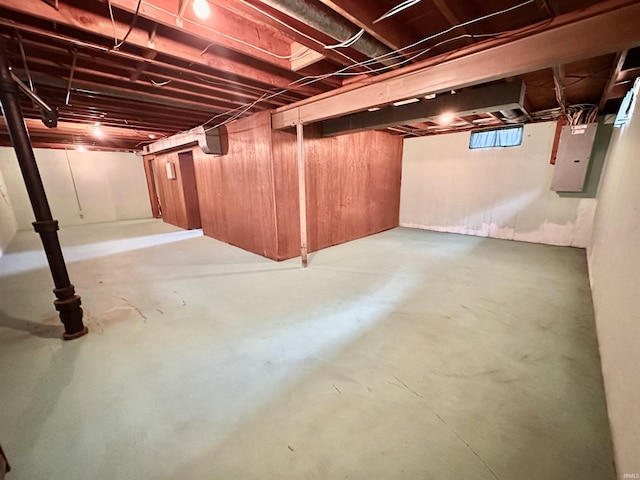 unfinished basement with electric panel