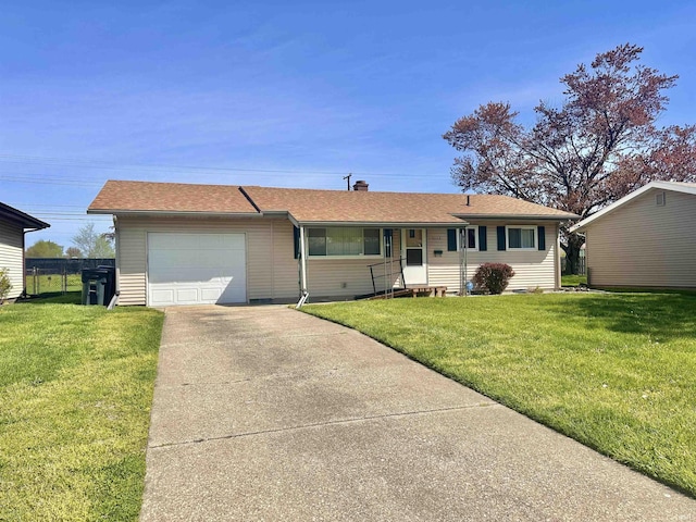 ranch-style home featuring an attached garage, driveway, a shingled roof, and a front yard