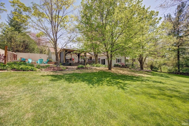 view of yard with fence
