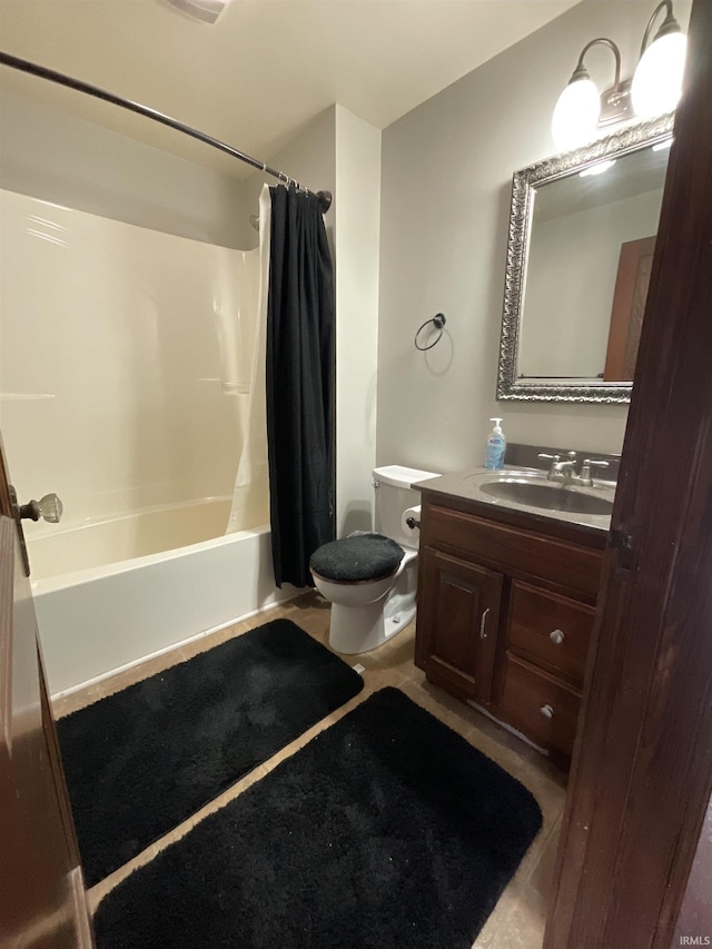 full bathroom featuring vanity, tile patterned flooring, toilet, and shower / bath combination with curtain