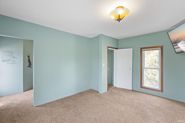unfurnished bedroom with carpet flooring