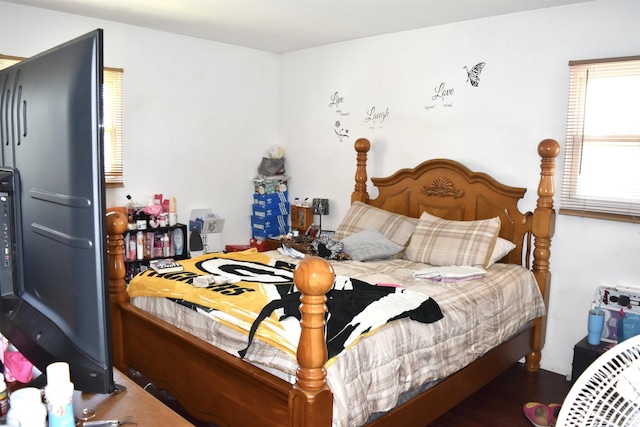bedroom featuring wood finished floors