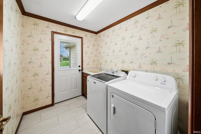 14157 Tenbury Dr, Granger, IN 46530 - clothes washing area with cabinet space, wallpapered walls, washer and clothes dryer, and ornamental molding