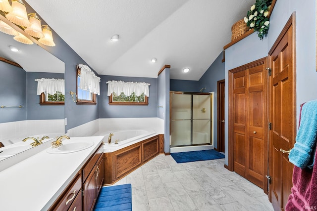 14157 Tenbury Dr, Granger, IN 46530 - full bath featuring lofted ceiling, a stall shower, marble finish floor, a garden tub, and vanity