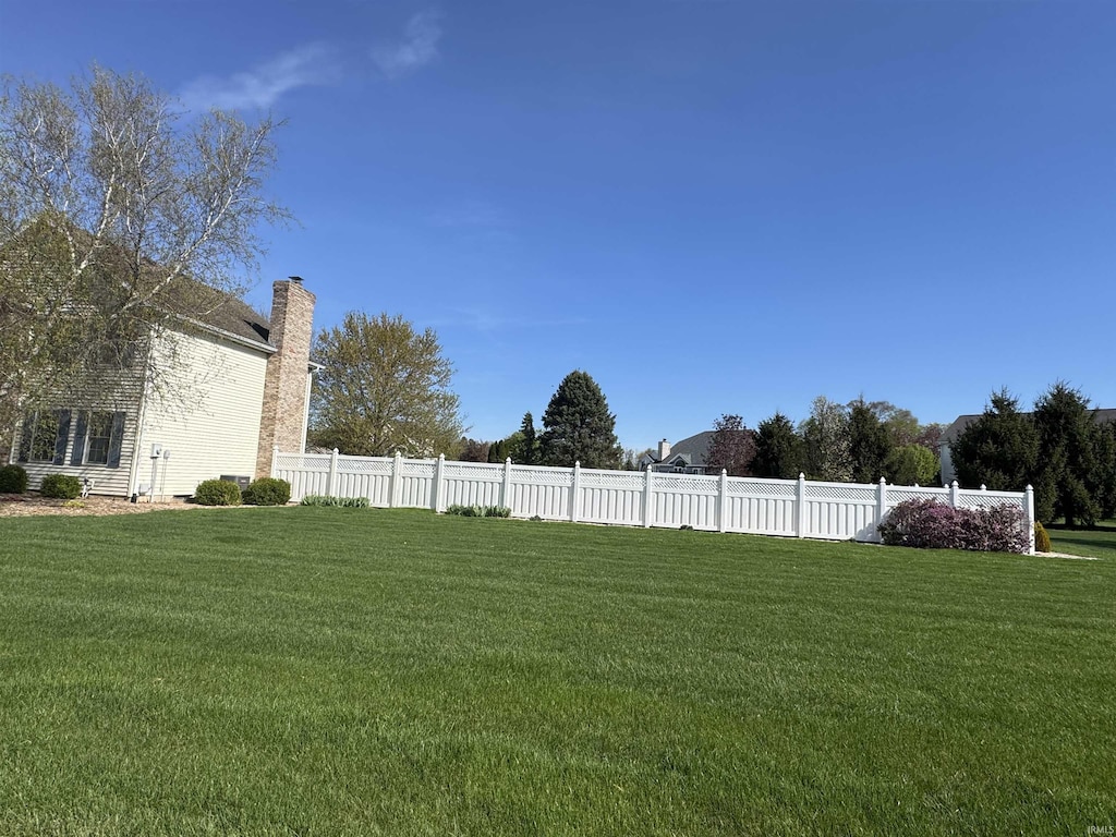 view of yard featuring fence