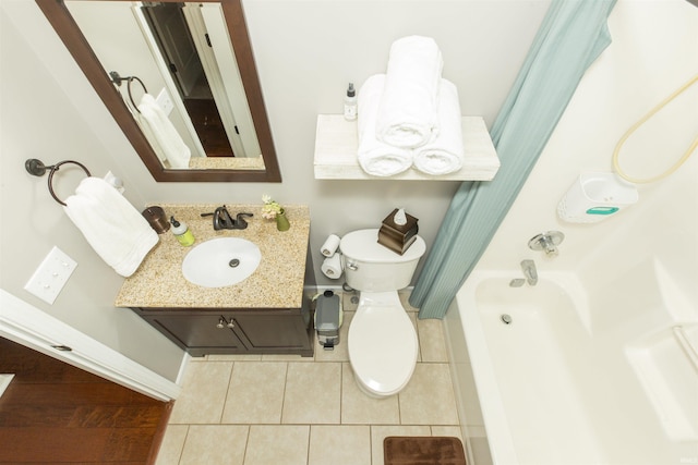 full bathroom featuring vanity, tile patterned flooring, toilet, and shower / bathtub combination with curtain
