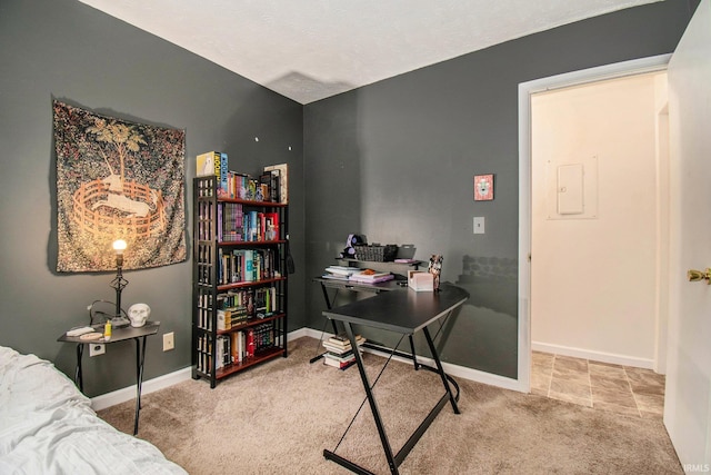 office space with baseboards and carpet