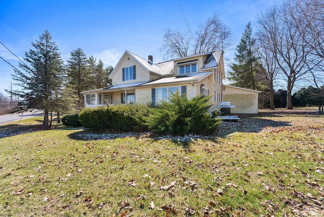view of property exterior featuring a yard