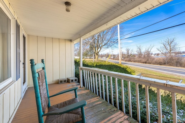 wooden deck featuring covered porch