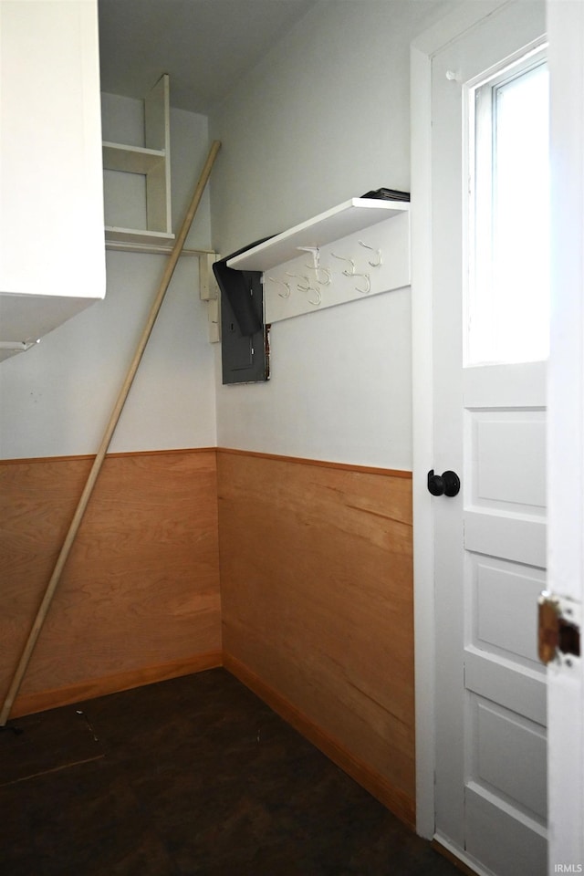 spacious closet featuring electric panel