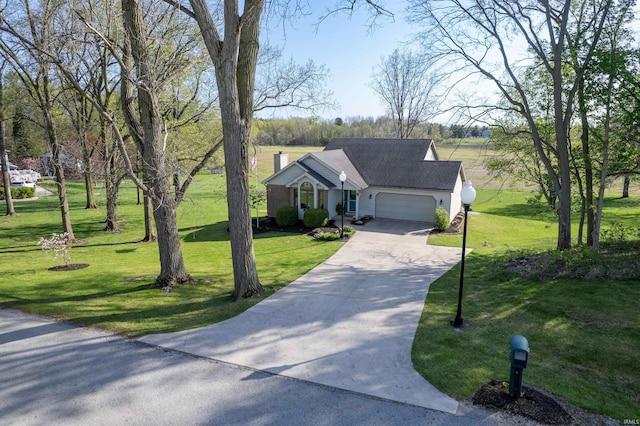 view of front of home featuring a chimney, a garage, driveway, and a front yard