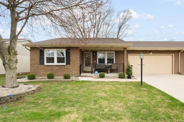 ranch-style home with covered porch, driveway, a front yard, a garage, and brick siding
