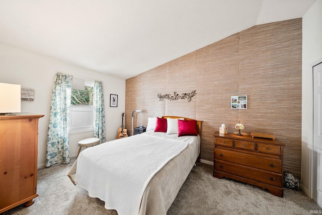 carpeted bedroom featuring vaulted ceiling