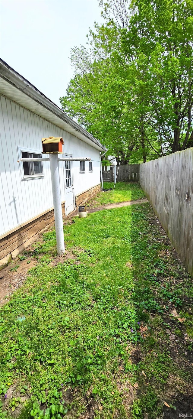 view of yard featuring a fenced backyard