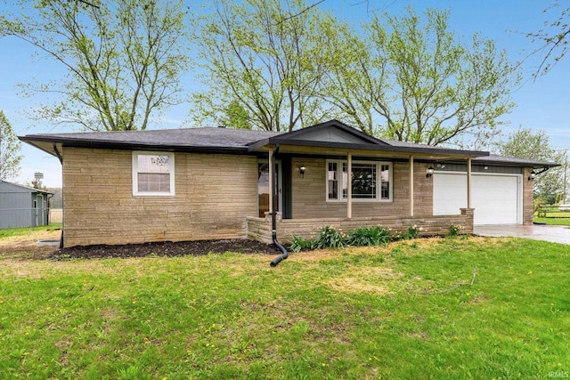 9231 Minnich Rd, Fort Wayne, IN 46816 - ranch-style home featuring an attached garage, driveway, and a front yard