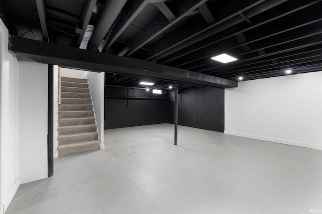 9231 Minnich Rd, Fort Wayne, IN 46816 - finished basement featuring baseboards and stairway