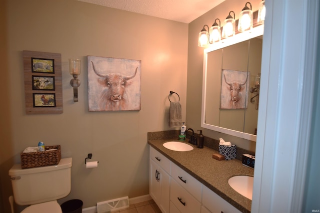 10035 N Turkey Creek Rd, Syracuse, IN 46567 - full bath featuring visible vents, a sink, tile patterned floors, and toilet