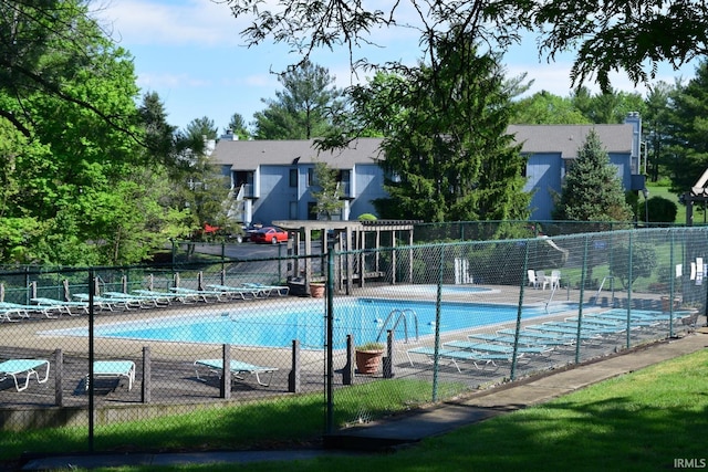 view of pool with fence