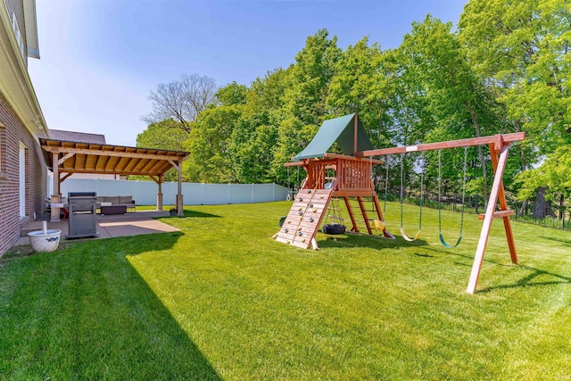 view of playground with a pergola, an outdoor living space, a lawn, a patio, and fence private yard