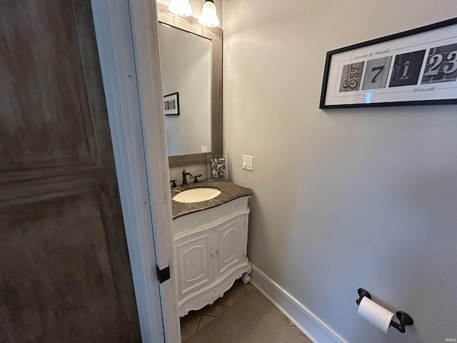 13546 Brick Rd, Granger, IN 46530 - bathroom featuring tile patterned flooring, baseboards, and vanity