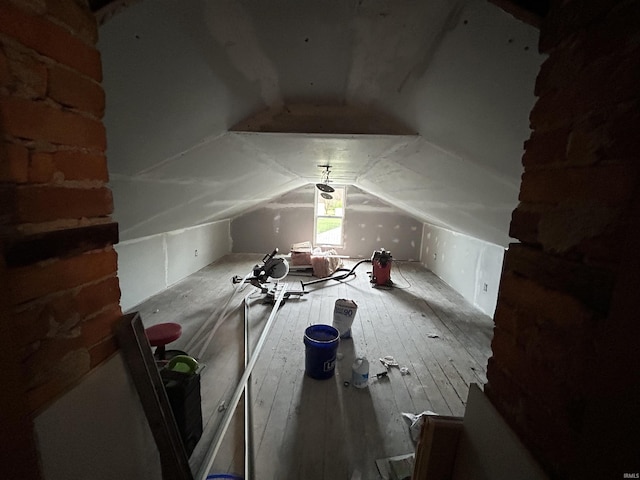 13546 Brick Rd, Granger, IN 46530 - additional living space with hardwood / wood-style flooring and lofted ceiling
