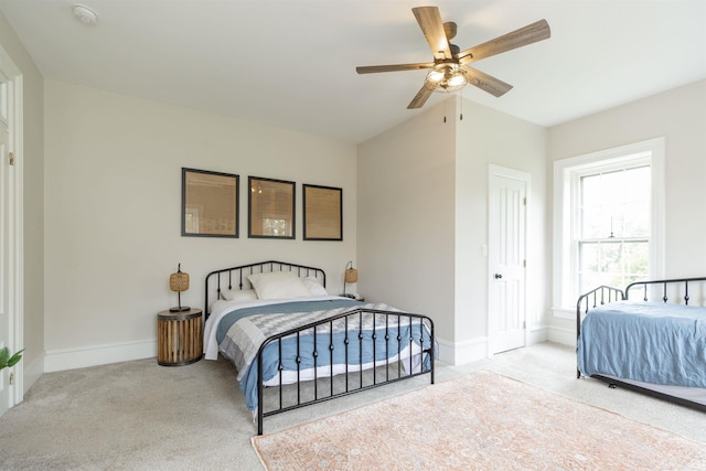 13546 Brick Rd, Granger, IN 46530 - bedroom with baseboards, carpet flooring, a ceiling fan, and lofted ceiling