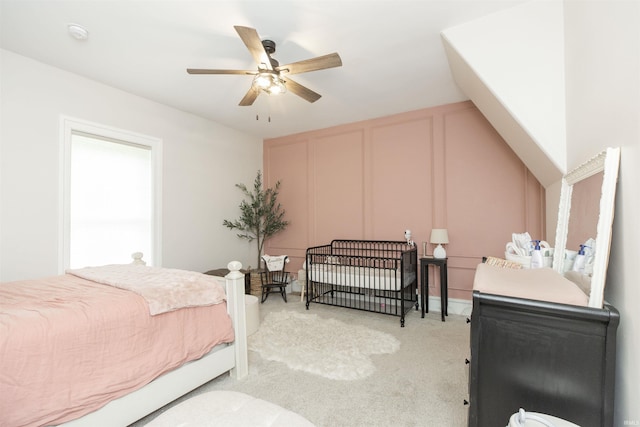 13546 Brick Rd, Granger, IN 46530 - bedroom featuring a ceiling fan, light colored carpet, and a decorative wall