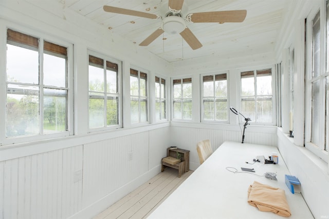 13546 Brick Rd, Granger, IN 46530 - sunroom featuring ceiling fan, wood finished floors, and a healthy amount of sunlight