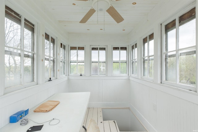 13546 Brick Rd, Granger, IN 46530 - unfurnished sunroom with a wainscoted wall and a wealth of natural light