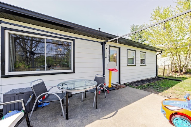 view of patio with outdoor dining area