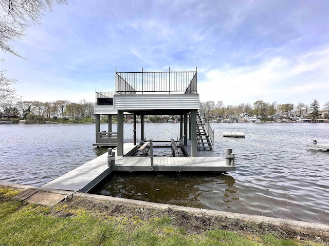 dock area with a water view