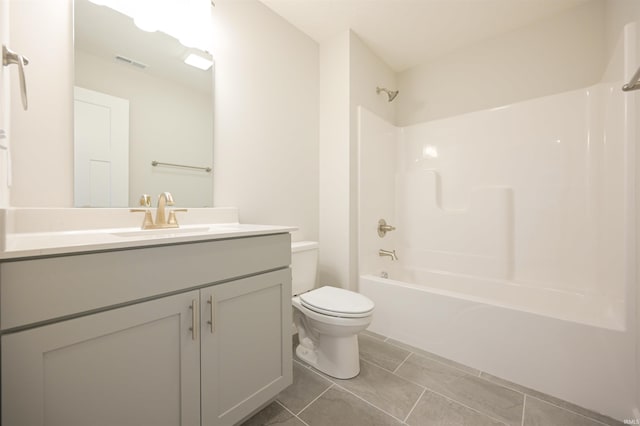 full bath featuring visible vents, washtub / shower combination, toilet, and vanity