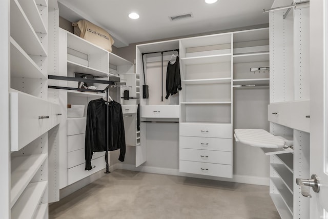 spacious closet featuring visible vents