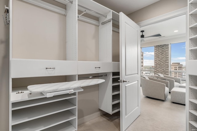 spacious closet featuring a ceiling fan