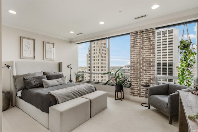 bedroom with recessed lighting, multiple windows, carpet, and ornamental molding