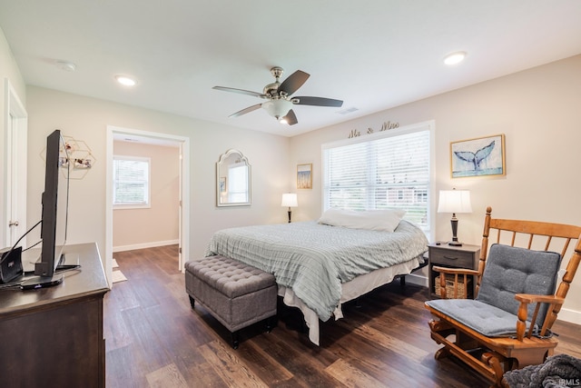 bedroom with dark wood finished floors, a ceiling fan, baseboards, recessed lighting, and visible vents