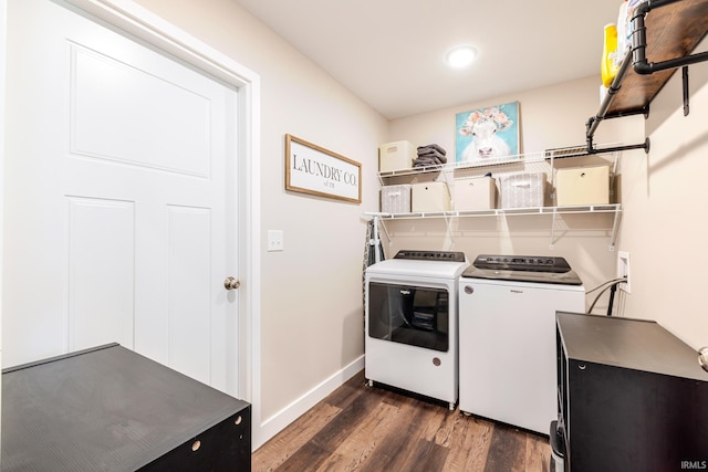 clothes washing area with washer and dryer, dark wood-style flooring, laundry area, recessed lighting, and baseboards