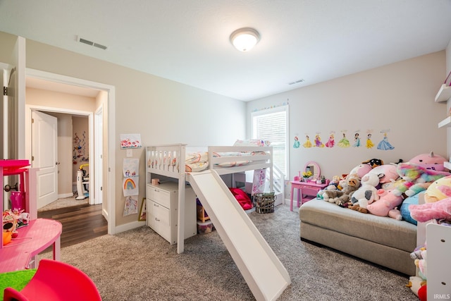 bedroom featuring carpet flooring, baseboards, and visible vents