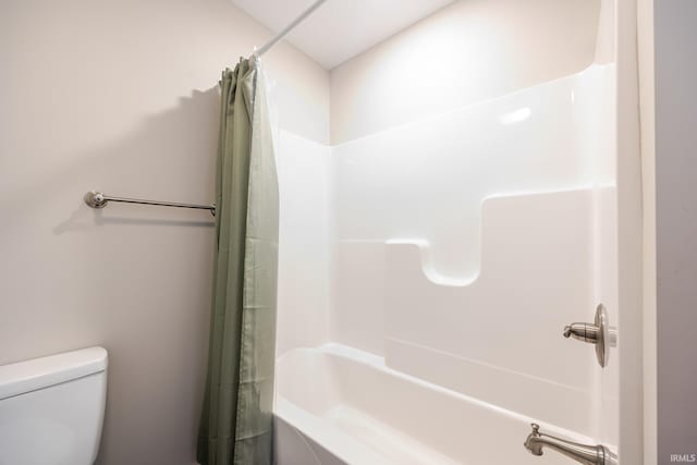 full bathroom with toilet and shower / bath combo