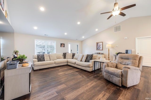 living area with a ceiling fan, dark wood-style flooring, and visible vents