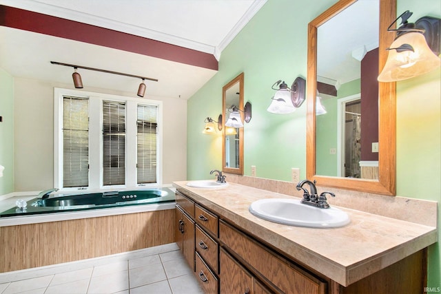 bathroom with a sink, track lighting, tile patterned flooring, and a bath