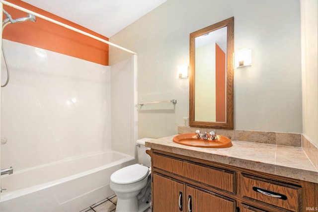 full bathroom with toilet, shower / washtub combination, tile patterned flooring, and vanity