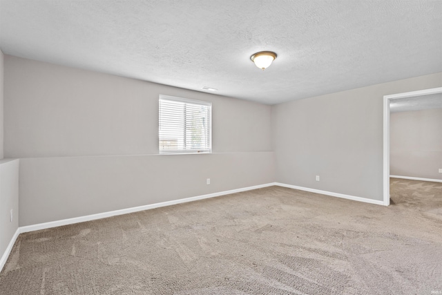 51779 Hannigan Dr, South Bend, IN 46637 - carpeted spare room with baseboards and a textured ceiling
