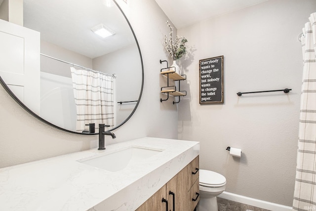 bathroom featuring vanity, baseboards, toilet, and a shower with shower curtain
