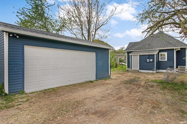 detached garage with driveway