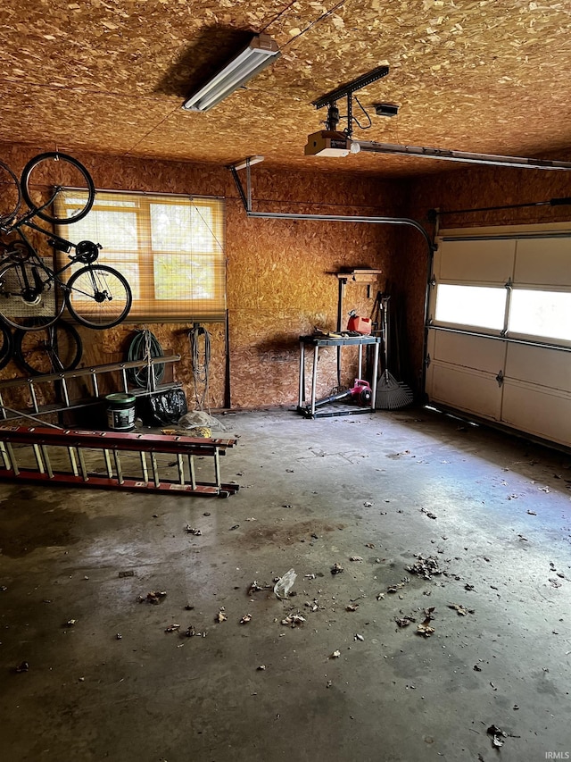 607 Troy Rd, Washington, IN 47501 - garage featuring a garage door opener