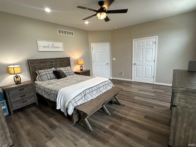 8679 E 850th St, New Carlisle, IN 46552 - bedroom with visible vents, baseboards, dark wood-style floors, recessed lighting, and a ceiling fan