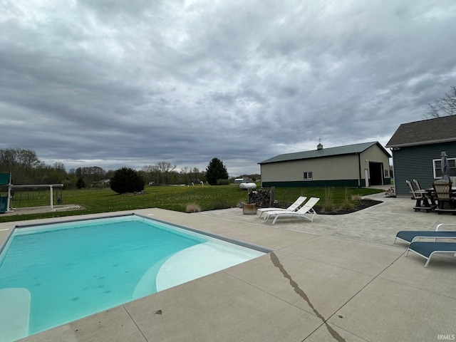 8679 E 850th St, New Carlisle, IN 46552 - outdoor pool featuring a lawn and a patio