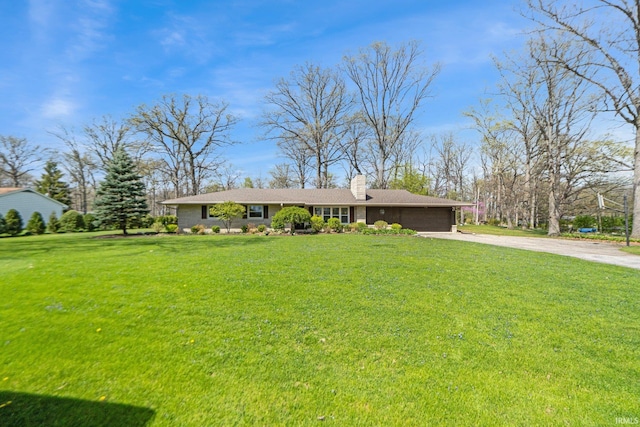 119 Southridge Dr, Fort Wayne, IN 46825 - ranch-style house featuring a garage, a chimney, concrete driveway, and a front yard